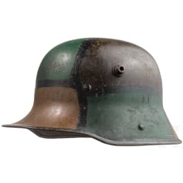 A steel helmet M 16 with mimicry paint