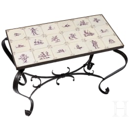 A forged iron side table with Delft tiles, circa 1900
