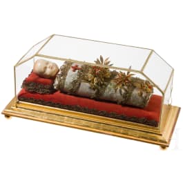 A South German swaddled baby with wax head in showcase, 19th century