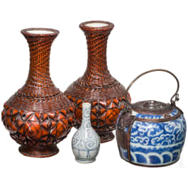 A Japanese set consisting of two Ikebana vases, a miniature vase and a handle pot, 19th century