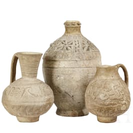 Three Persian-Islamic clay vessels with relief decoration, 10th - 15th century