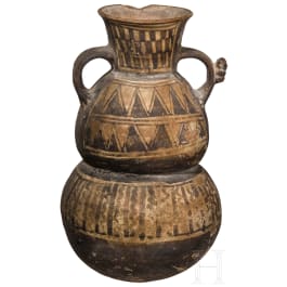 A Peruvian clay vessel, Peru, circa 1000 A.D.