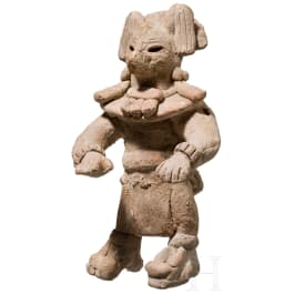 A rare Mexican terracotta figure with a coyote mask, Veracruz, circa 900 - 1200 A.D.