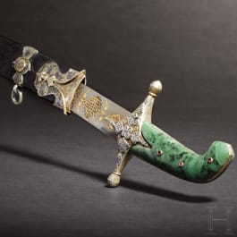 An Ottoman silver-mounted and nielloed, gold-inlaid kilij with a nephrite handle, 2nd half of the 17th century