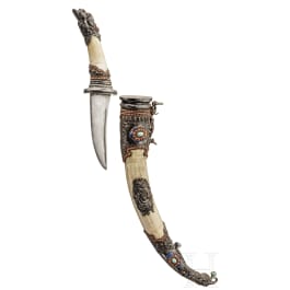 A silver-mounted Tibetan dagger with ivory scabbard, circa 1900