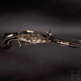 A bone-inlaid and partially gilt musket with combined matchlock and wheellock action, Suhl, circa 1570