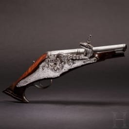 A rare northern French wheellock pistol with an elaborately chased lock, circa 1570