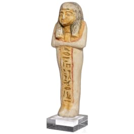 An Egyptian ushebti figure, 19th dynasty, 1306-1186 B.C.