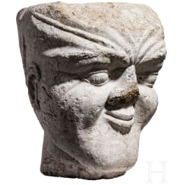 An Italian limestone capital in the shape of a head, 14th/15th century