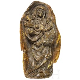 A baroque German amber carving of St. Anna, 17th century