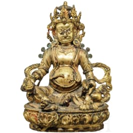 A Nepalese gilded bronze figure of Jambhala, 19th century