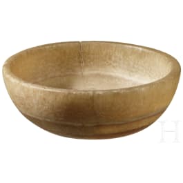 An Egyptian or Near Eastern alabaster bowl, 2nd - 1st millennium B.C.