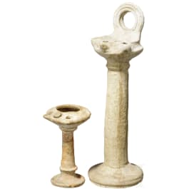 Two tall Byzantine oil lamps, 5th - 9th century