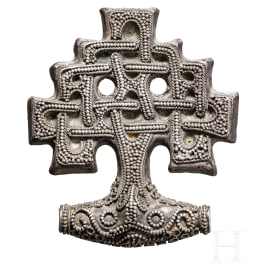 A charmful Viking silver pendant, 10th century