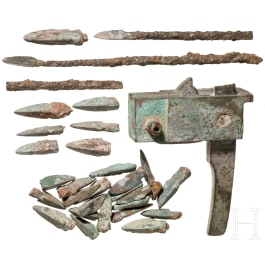 A Chinese crossbow lock and a lot of 29 arrow heads, Han dynasty, 206 B.C. – 220 A.D.