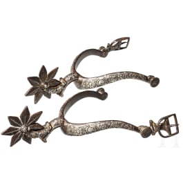 A pair of German/French silver-inlaid spurs, 17th century