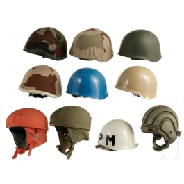 Ten French military helmets