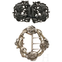 A silver and an ebony art-nouveau belt buckle, French (one), circa 1910