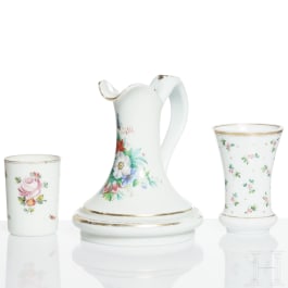 A Bohemian milk glass jug and two beakers, early 19th century