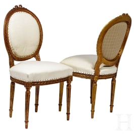 A pair of German padded chairs in Louis XVI style, 20th century