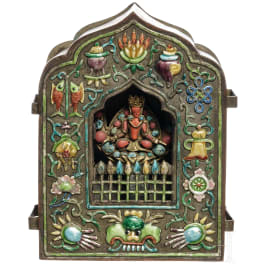 A Tibetan brass gau (travelling cabinet), 20th century