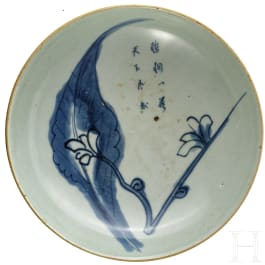 A Chinese plate with blue and white decoration, 18th - 19th century