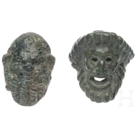 Two Roman head appliqués, 2nd - 3rd century