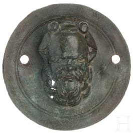 A Roman bronze appliqué with a satyr's head, 2nd - 3rd century