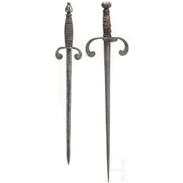 Two lefthand daggers, collector's replicas in the style of the 17th century