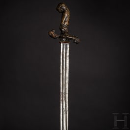 An important German deluxe hunting hanger with handle and guard made of finely carved rhinoceros horn, circa 1680