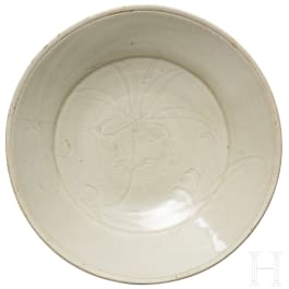 A fine carved 'Lotus' hexafoil Ding bowl, northern Song Dynasty (960 - 1127)