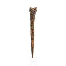 A Papua New Guinean carved bone dagger, 19th century