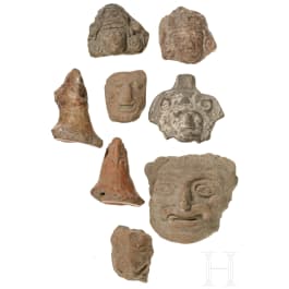 Eight Central American terracotta heads, pre-Columbian