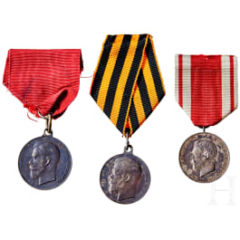 Zwei Medaillen für Eifer und eine für Tapferkeit, Russland, um 1900 - 1916