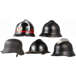 Five international fire fighter or civil defence helmets, 1940s - 1960s