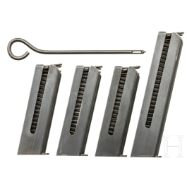 Four magazines for an FN Mod. 1903, cleaning rod