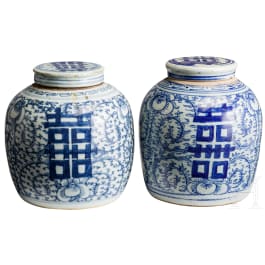 A pair of Chinese blue and white lidded vases, late Qing period