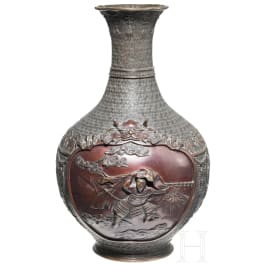 A large Japanese relief bronze vase, Meiji period