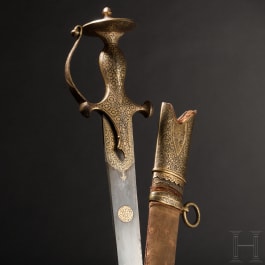 A gold-inlaid Indian tulwar with single-edged blade of fine, grained wootz-Damascus steel, 1st half of the 19th century