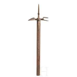 A collector's replica of a war hammer in the style of the 15th century