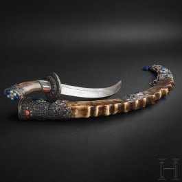 A magnificent Tibetan scimitar, 19th/20th century