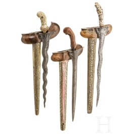 Three Indonesian kerises with handles of bone and wood, circa 1900