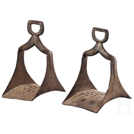 A pair of Moroccan silver damascenend stirrups, 19th century