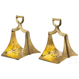 A pair of Moroccan engraved stirrups, 19th century