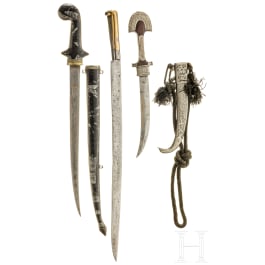 A North African yatagan and two daggers, 19th/20th century
