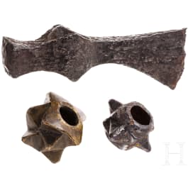 Two Eastern European mace heads and an axe, 12th/13th century
