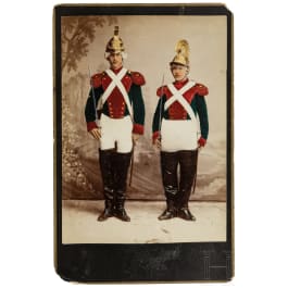 A hand-coloured photo of two dragoons