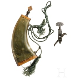 A German powder flask and a spanner, 18th century