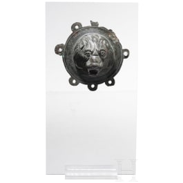 A round Roman appliqué with lion's head, 2nd - 3rd century A.D.