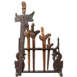 Five Indonesian kerises and a stand, 20th century